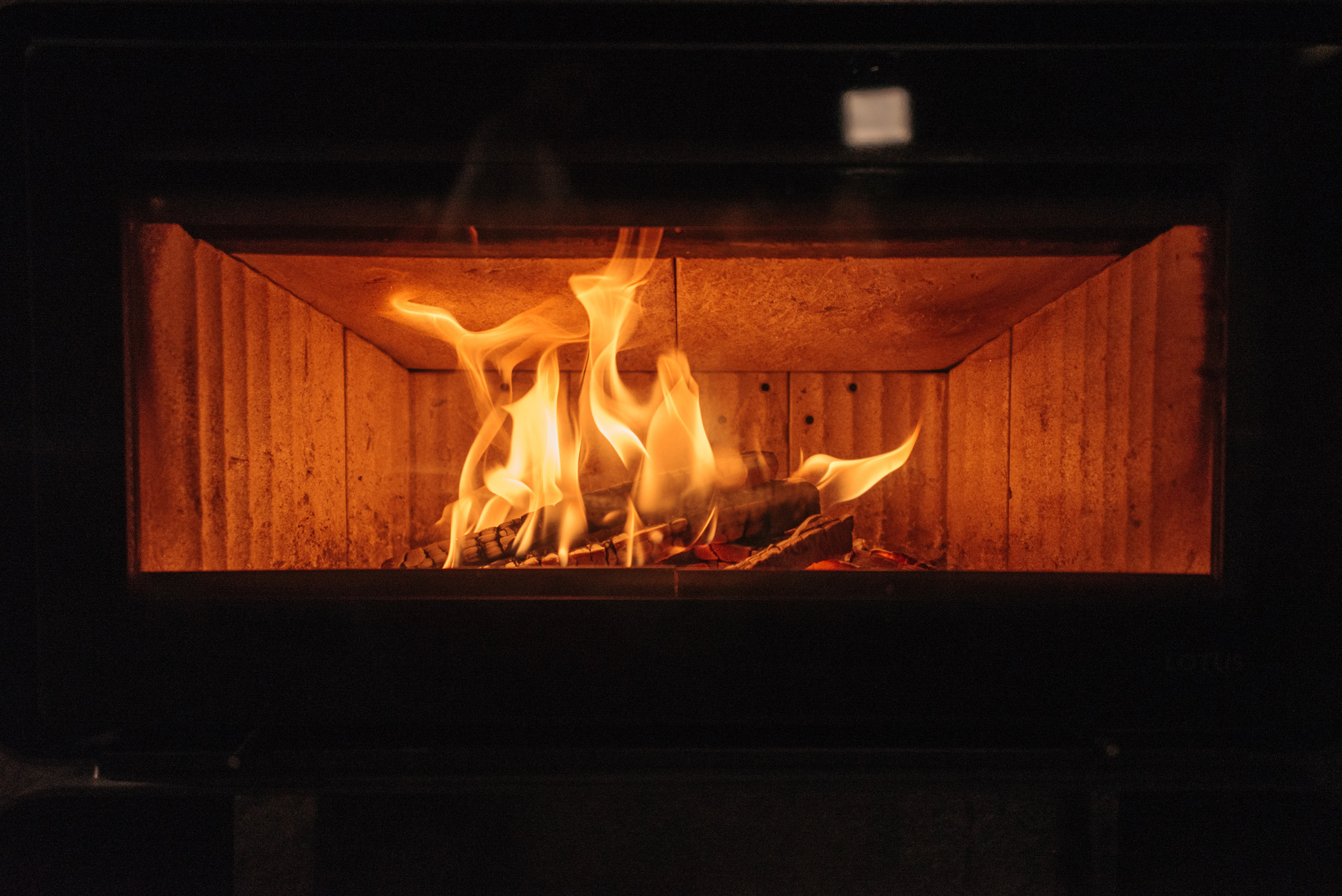 Photograph of a Lit Fireplace